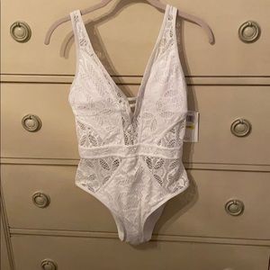 Becca woman’s color play deep V neck one piece